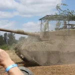 Немачка у Литванији поставила антидронске мрежасте екране на Фуцхс и Леопард 2